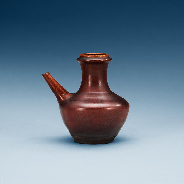 A chesnut brown glazed kendi, Yuan dynasty (1280-1368).