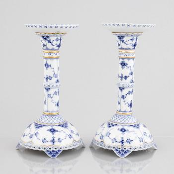 A pair of 'Blue Fluted Full Lace' porcelain Candle sticks, Royal Copenhagen, model number 1008, post 1923.