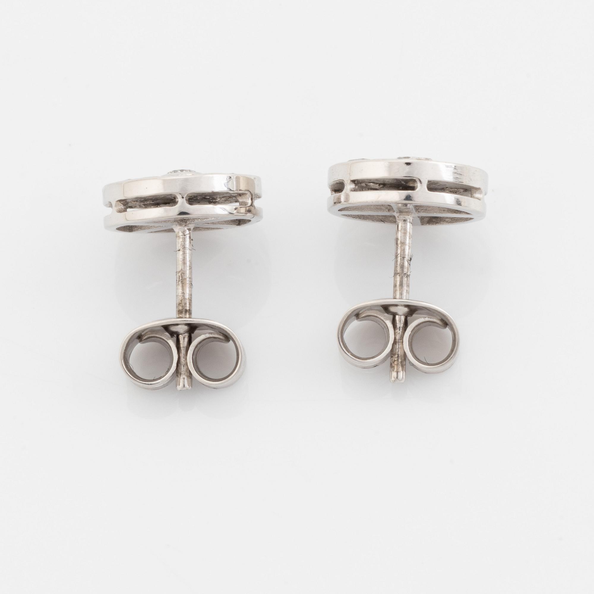 Brilliant and baguette cut diamond earrings.