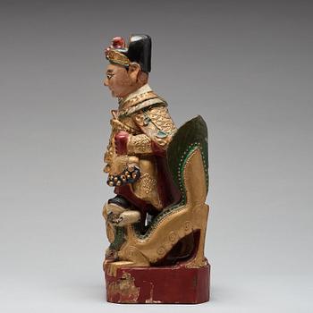 A lacquered wooden figure, Qing dynasty, 19th century.