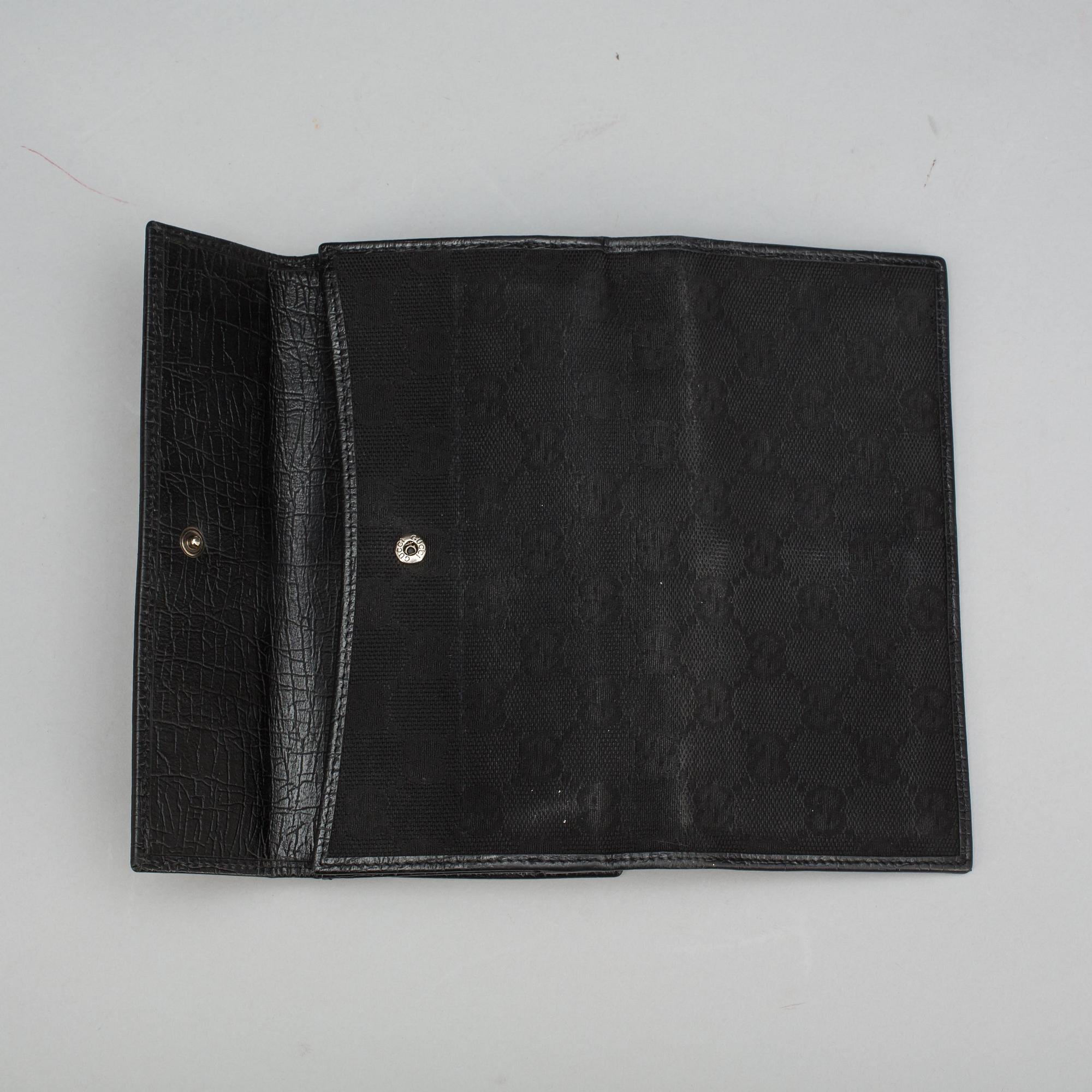 PLÅNBOK, Gucci, 2000-tal.