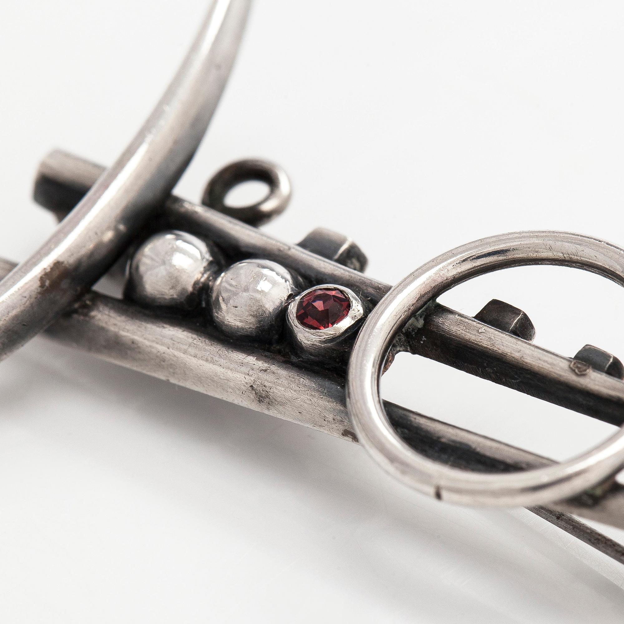 Heikki Kaksonen, brooch, faceted garnet, silver, Helsinki 1957.