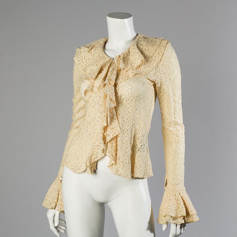 A wool/alpaca jacket by Ralph Lauren and two blouses.