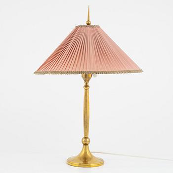 Harald Notini, a Swedish Grace '6851' brass table light, Arvid Böhlmarks Lampfabrik, Stockholm, 1920's.