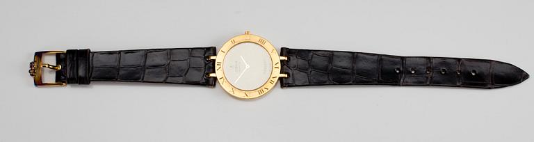 ARMBANDSUR, dam, 18K guld, Corum Romulus Quartz, original läderarmband.