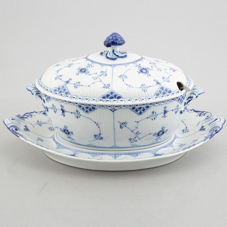 A 'Blue fluted half lace' / 'Musselmalet' porcelain tureen with cover and stand, Royal Copenhagen, model 595, 598, 1947.