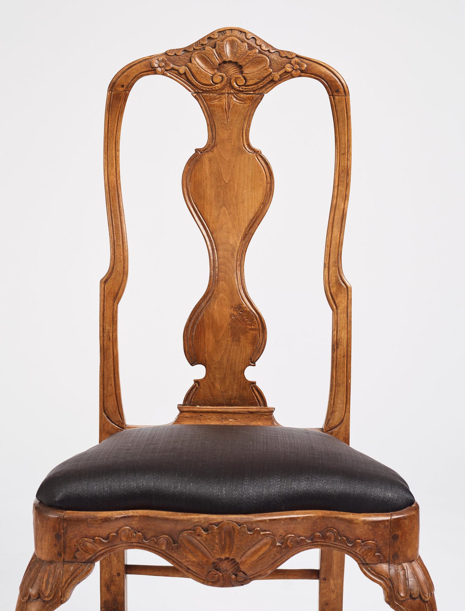 A set of four matched Swedish Rococo chairs, second part of the 18th century.