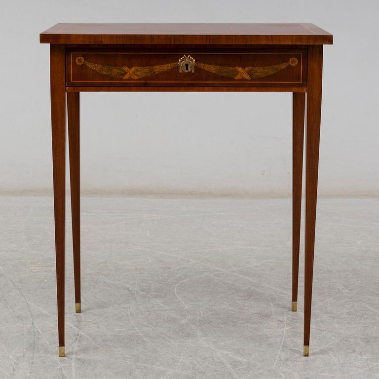 A gustavian style sewing table, early 20th century.