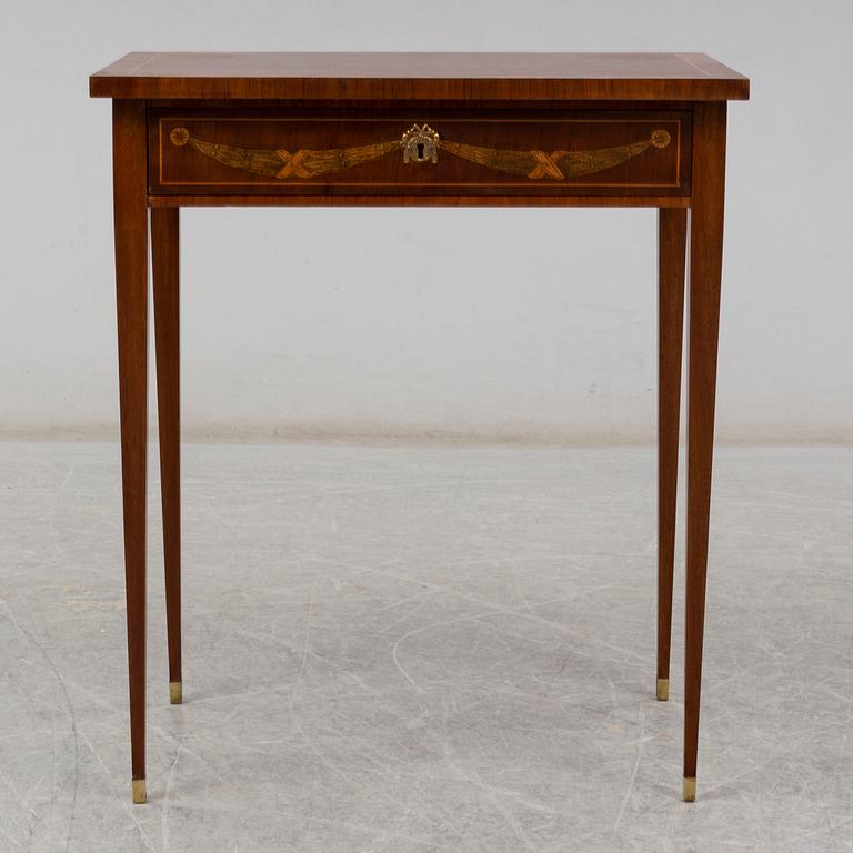 A gustavian style sewing table, early 20th century.