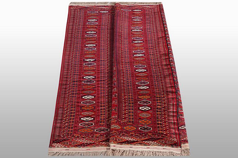A carpet, semi-antique Tekke, ca 330 x 250 cm.