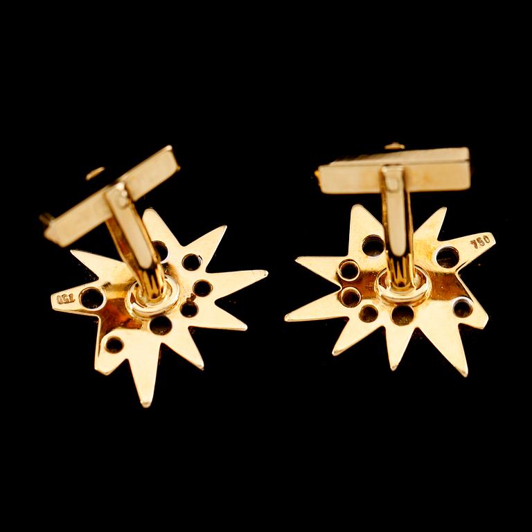 MANSCHETTKNAPPAR, 1 par, 18 k guld/vitguld, briljantslipade diamanter tot ca 0.90 ct. Total vikt 27 g.