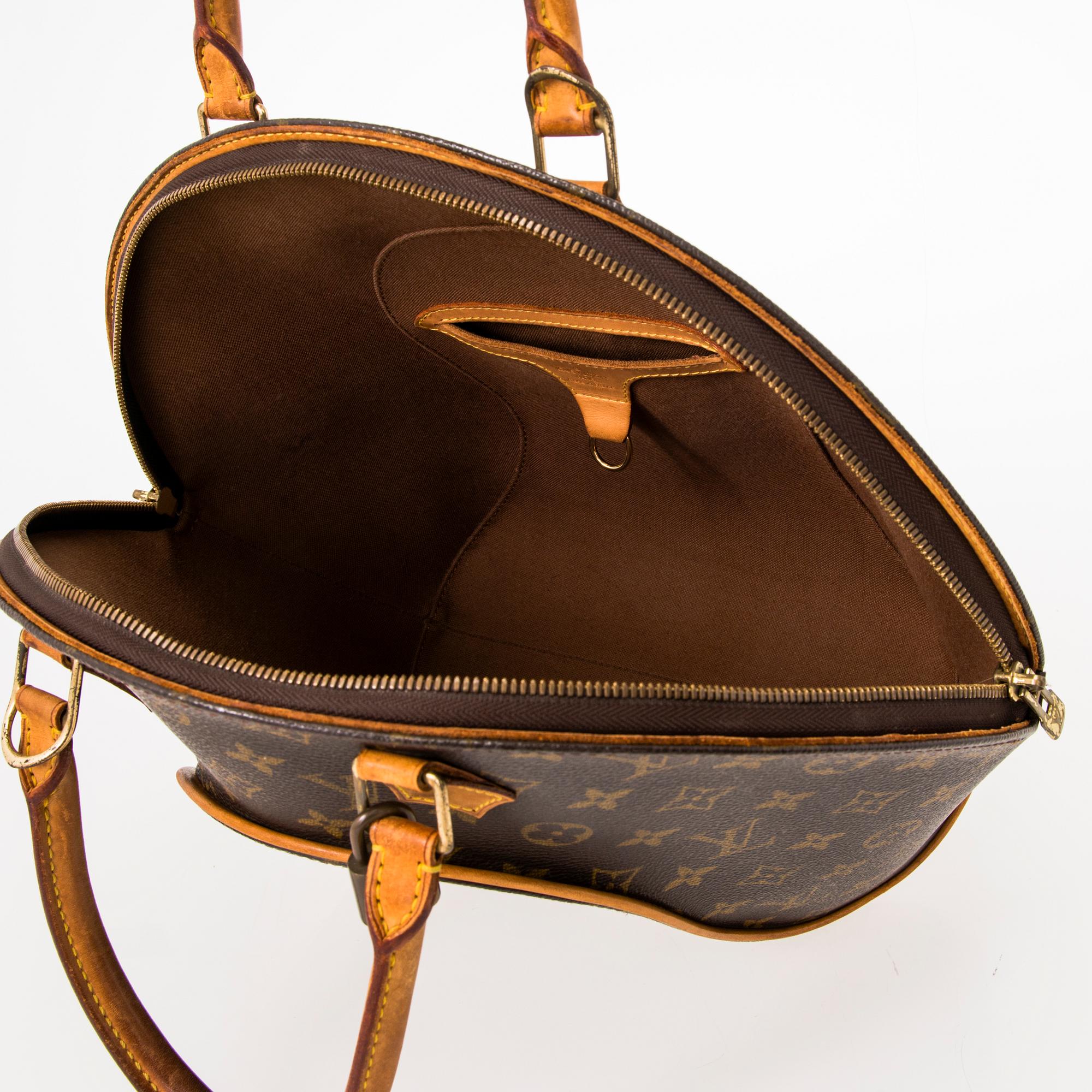 LOUIS VUITTON MONOGRAM CANVAS ELLIPSE MM HAND BAG.