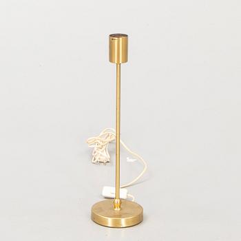 A Josef Frank brass table lamp nr 2332 for Firma Svenskt Tenn later part of the 20th century.