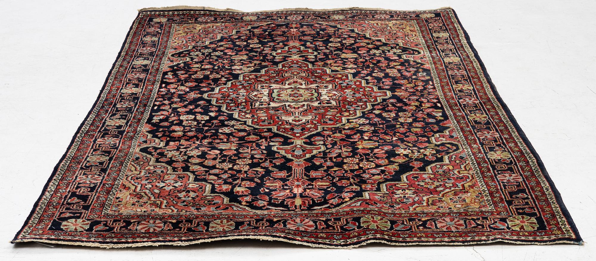 A semi-antique Sarouk rug, west Persia, c. 205 x 131 cm.