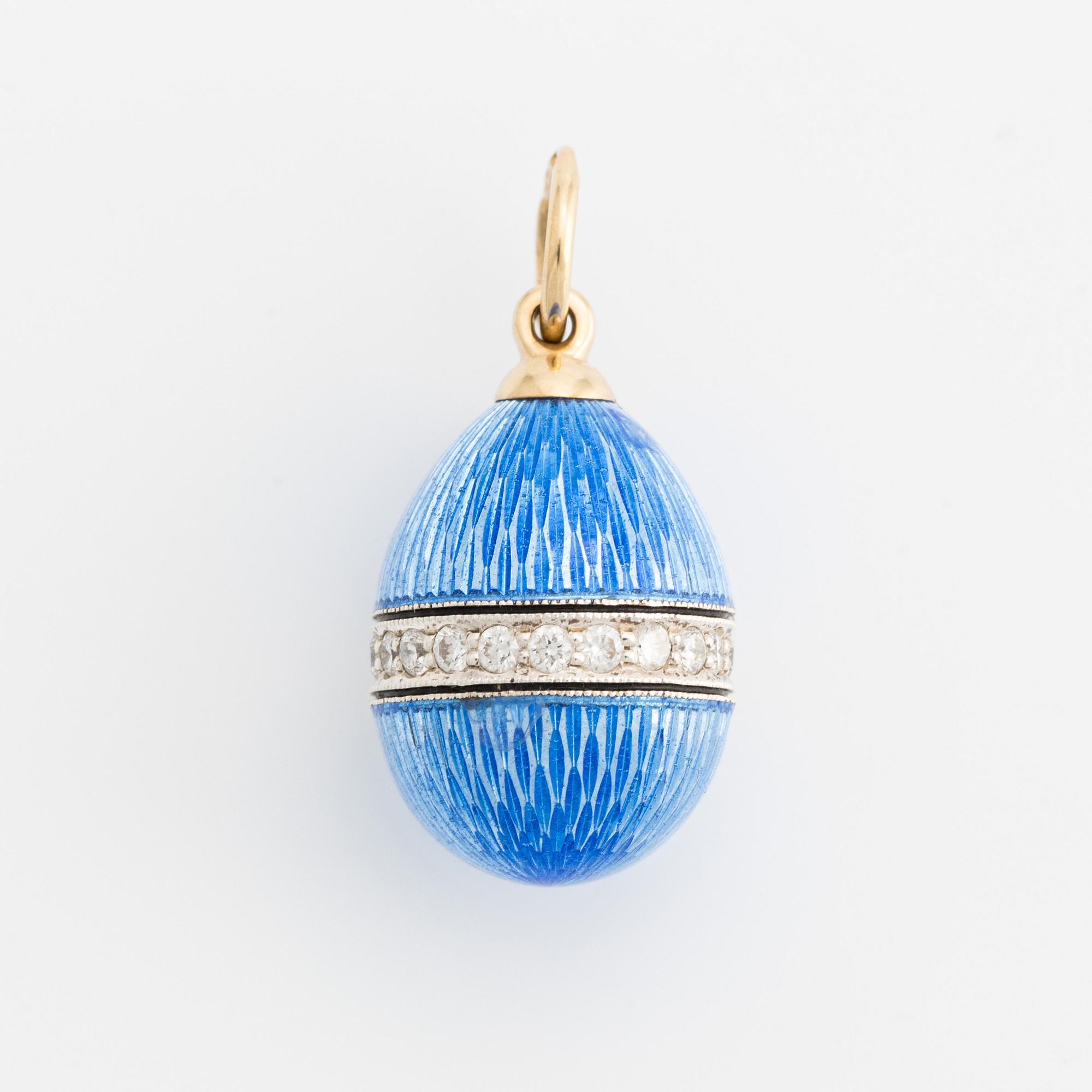 W.A Bolin, jeweled egg with blue and black enamel and a band of brilliant-cut diamonds.