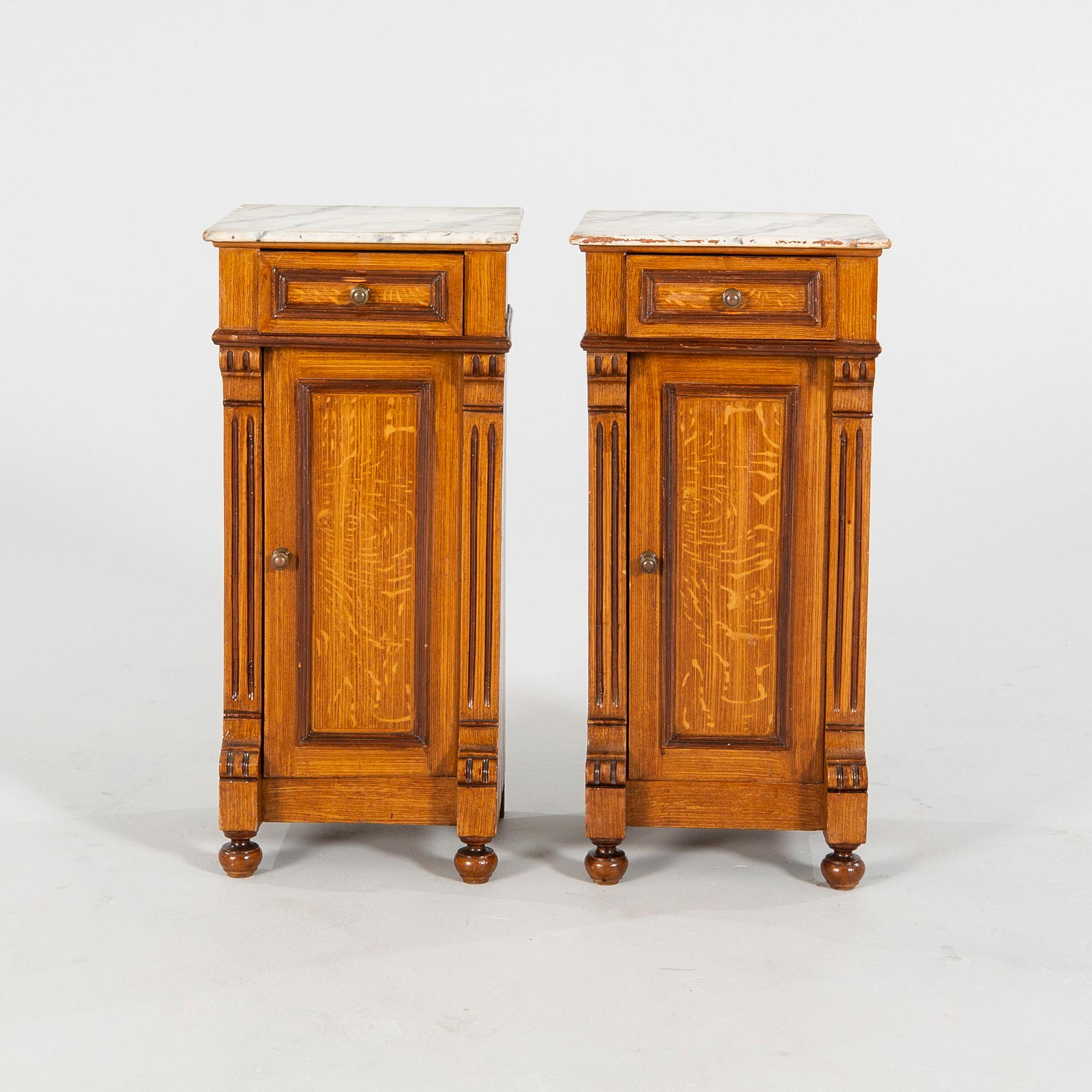 A pair of Neo Renaissance  bedside tables.