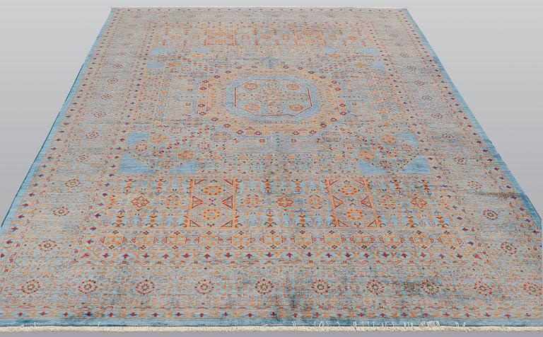 An oriental carpet with a Mamluk pattern, ca 299 x 210 cm.