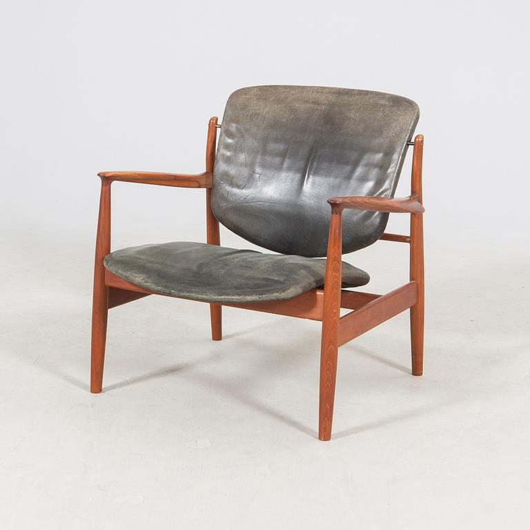 Finn Juhl, a teak armchair model nr 136 France & son Denmark.