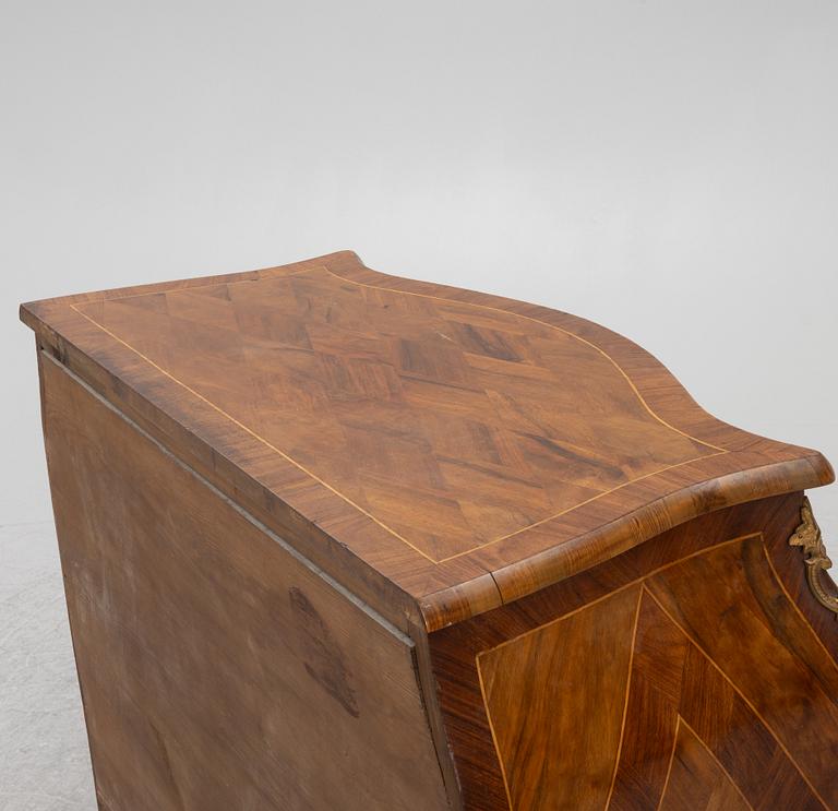 A Rococo chest of drawers, 18th century.