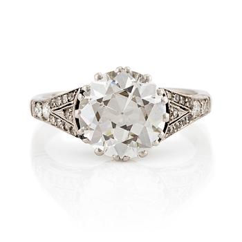 566. A platinum ring set with an old-cut diamond.