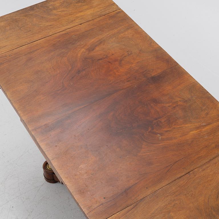 An Empire table, first half of the 19th century.