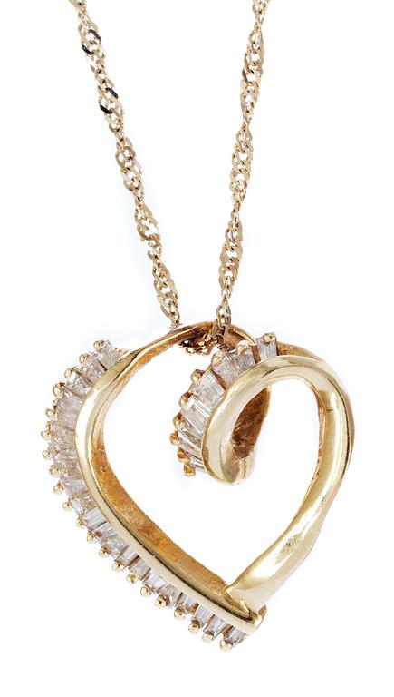 HÄNGSMYCKE, i form av hjärta med diamanter ca 0.50 ct.