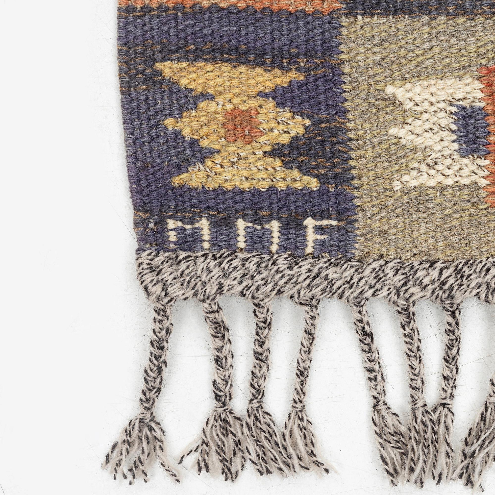 Märta Måås-Fjetterström, a carpet, 'Tolvbladsmattan', flat weave, c. 205 x 95 cm, signed MMF.