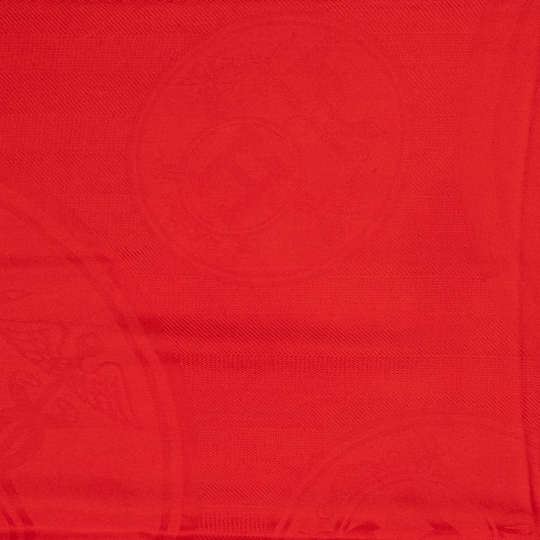 Hermès, a red cashmere and silk mix shawl.