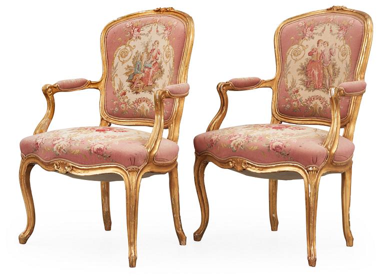 A pair of Rococo 18th century armchairs.