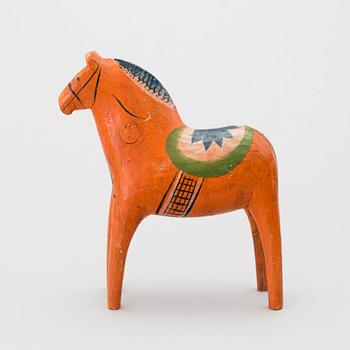 A painted folk art dala horse first half of the 20th century.