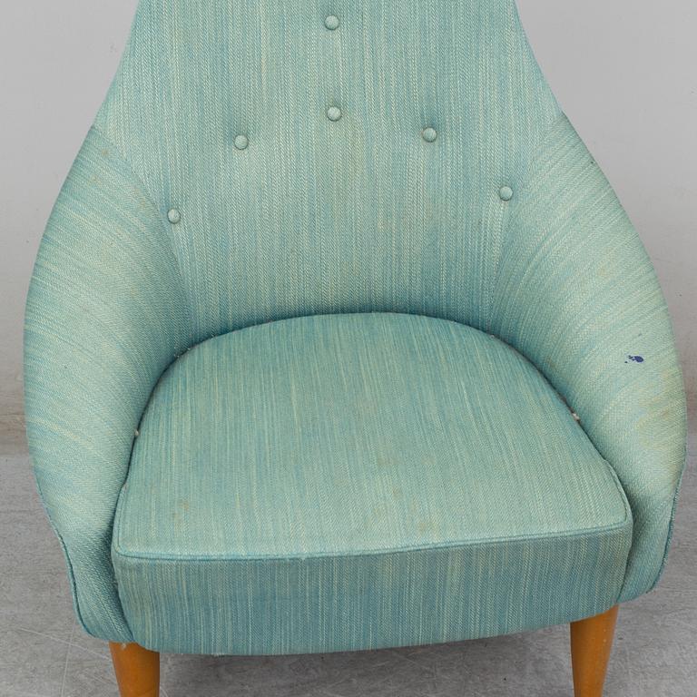 KERSTIN HÖRLIN-HOLMQVIST, a 'Lilla Eva' easy chair, for Nordiska Kompaniet, mid 20th century.