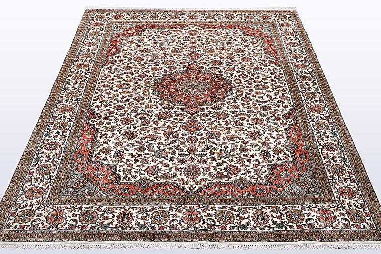 A carpet, silk Kashmir, ca 260 x 172 cm.