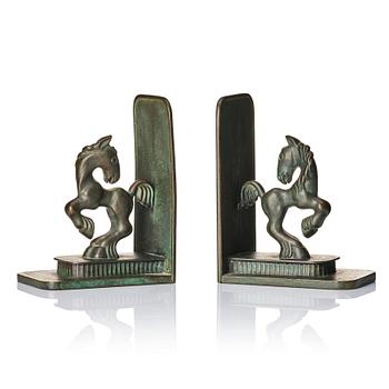 399. Carl-Einar Borgström, a pair of patinated bronze bookends, Ystad Brons, 1930-40s.