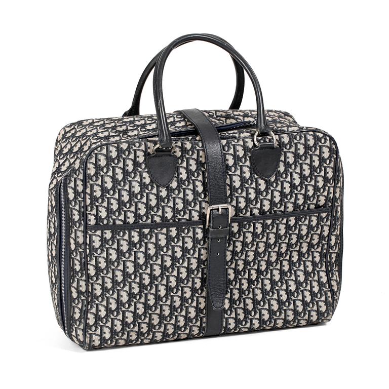 CHRISTIAN DIOR, a monogram canvas weekend bag.