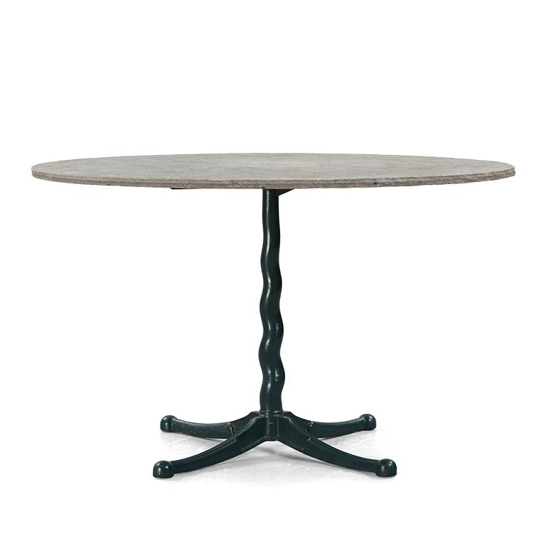 Josef Frank, attributed to, a cast iron table with granite top, Firma Svenskt Tenn, Sweden, 1930s-40s.