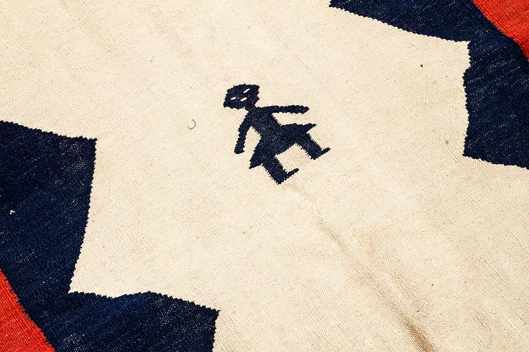 A KILIM RUG, 257 x 180 cm.