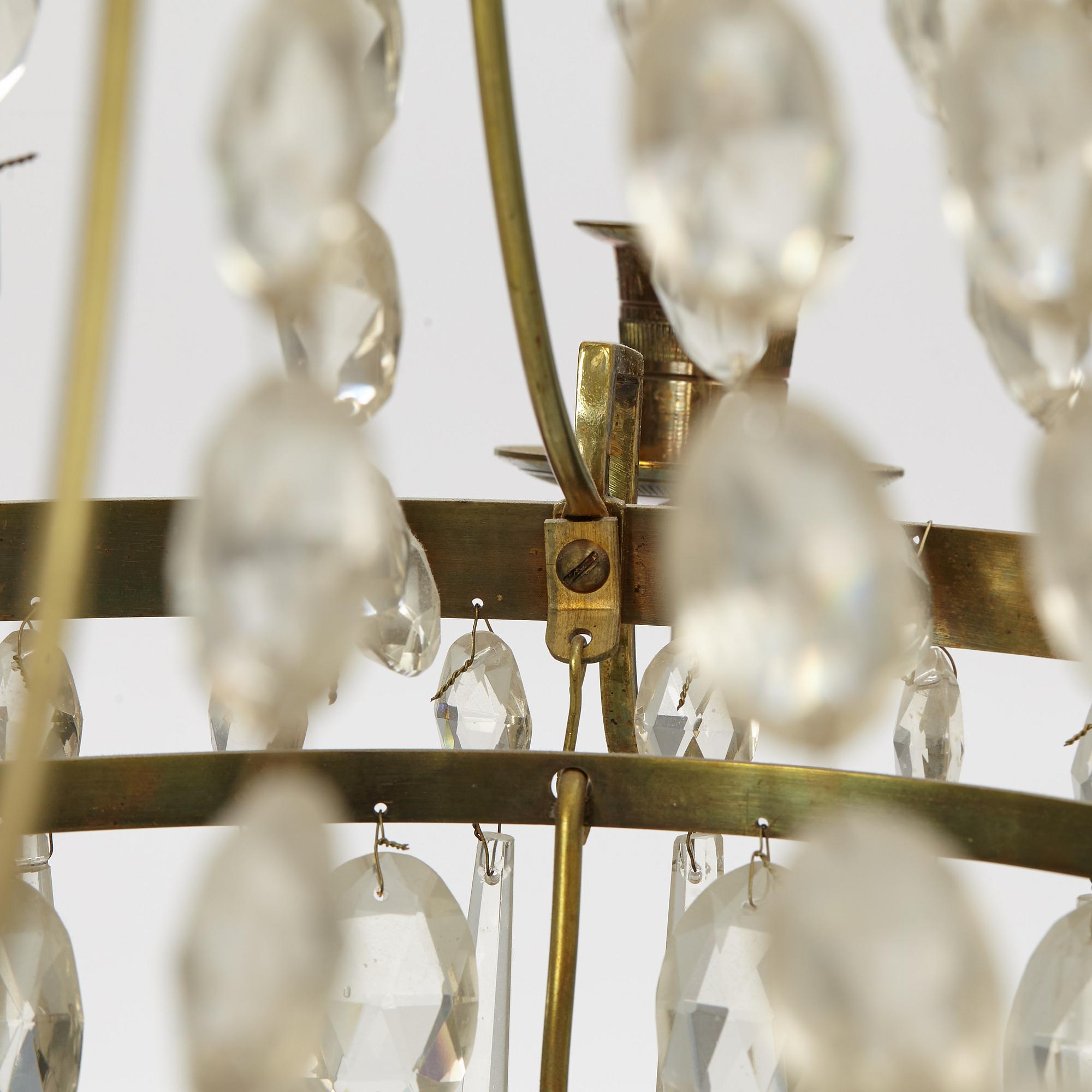 A four-branch Gustavian style chandelier, mid 20th century.