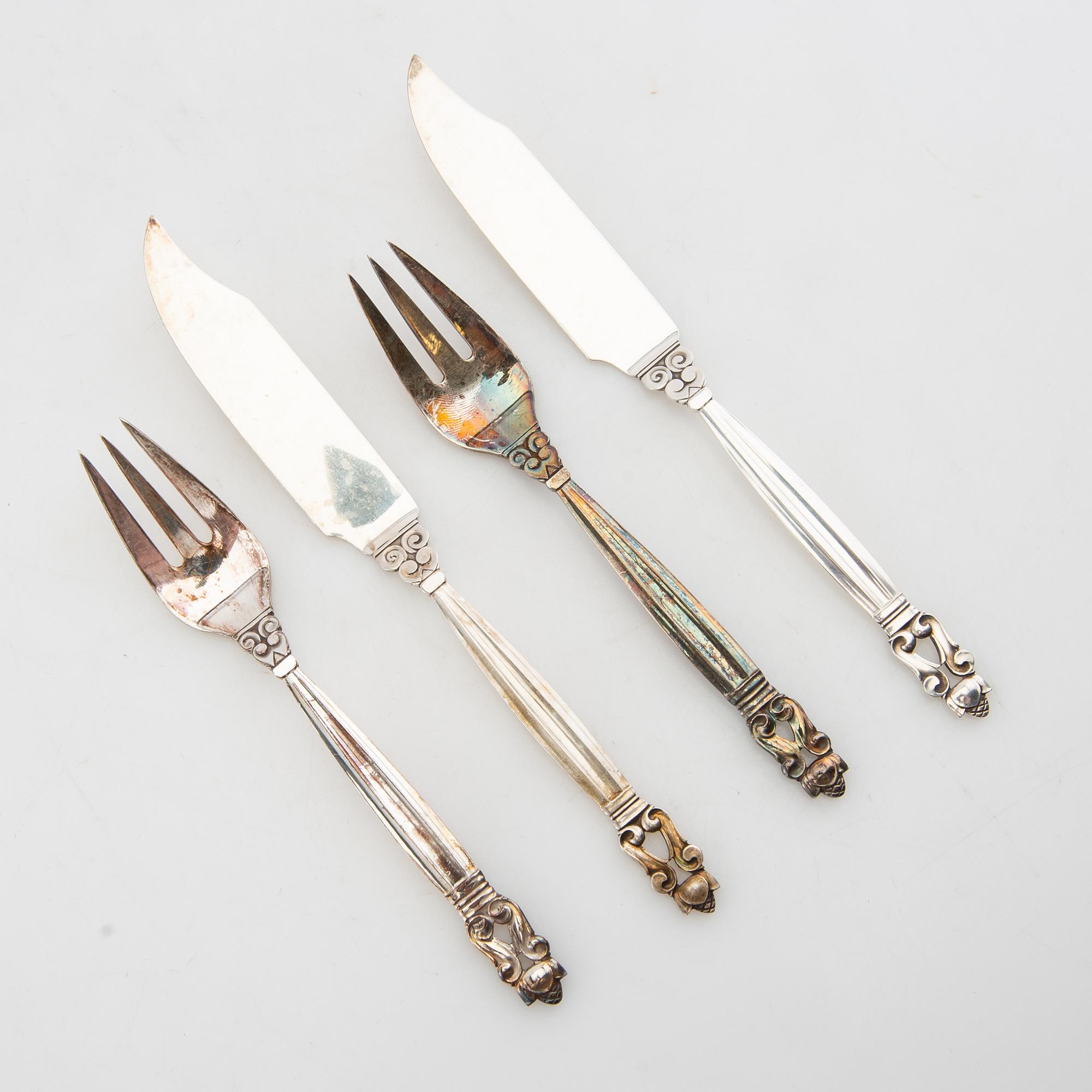 Johan Rohde, fiskebestick 12 dlr "Konge/Achorn" sterlingsilver för Georg Jensen efter 1945.