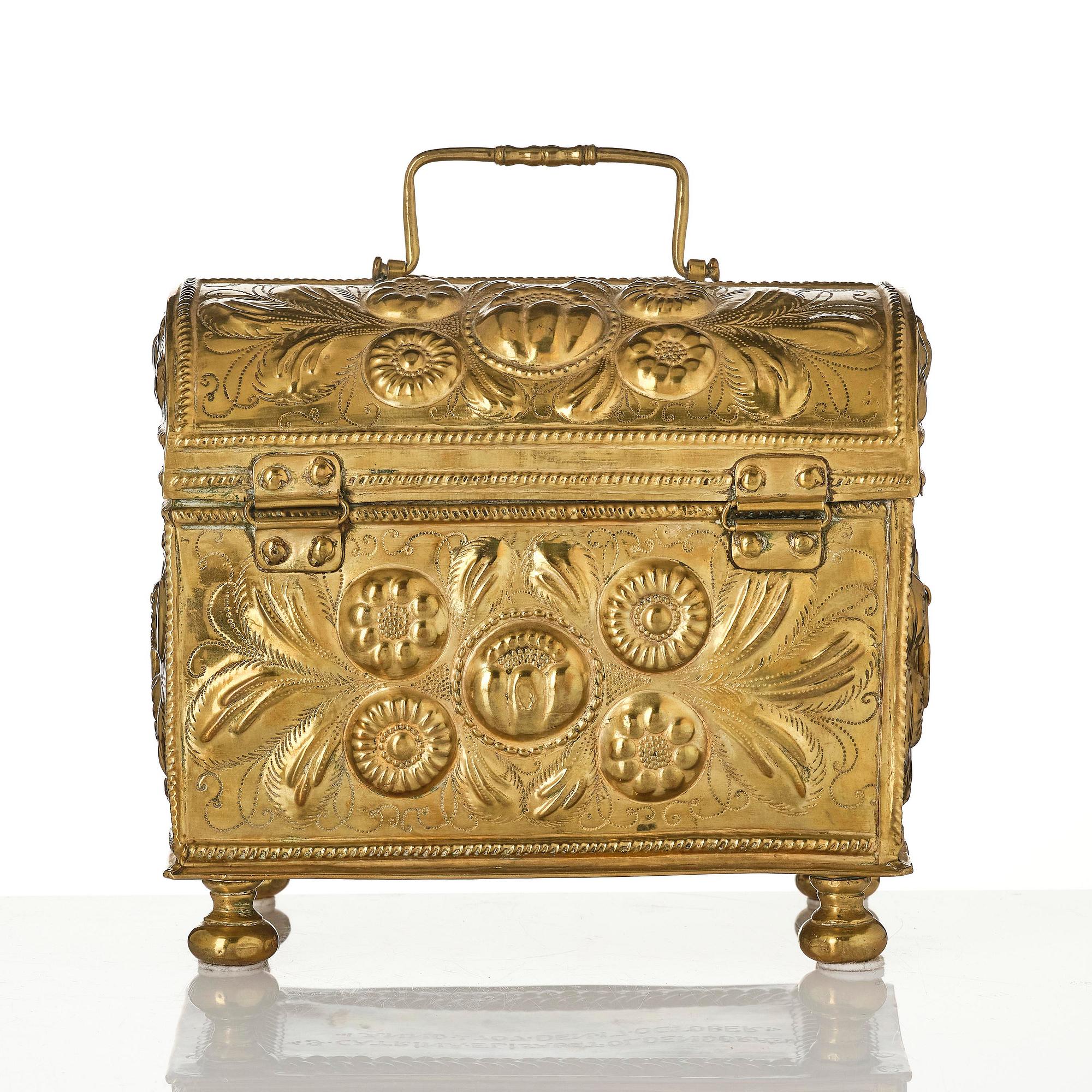 A Swedish baroque repousse brass box, dated 1707.