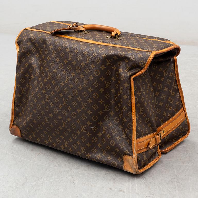 LOUIS VUITTON, a monogram canvas garment bag.