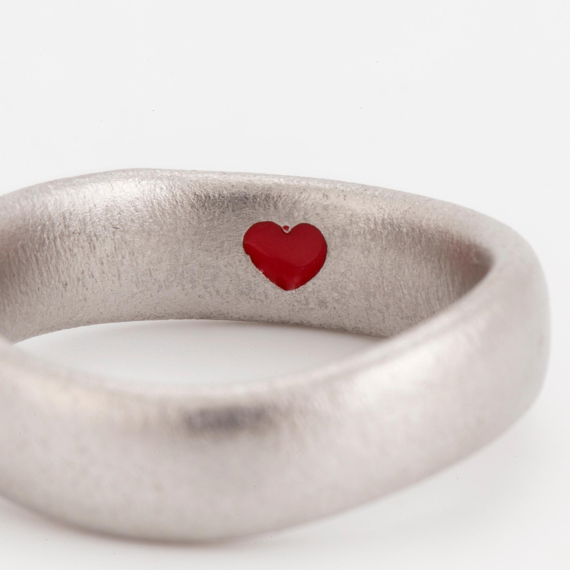 A 'Love nr 7' ring by Ole Lynggaard.