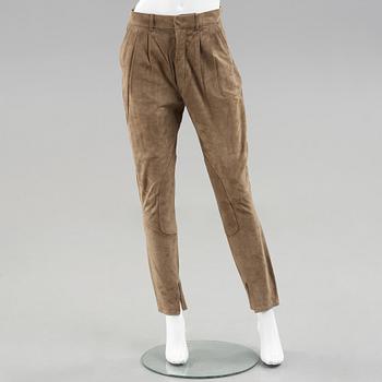 A pair of green suede pants by Ralph Lauren.