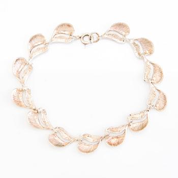 A set of sterling silver necklace and bracelet. Valo-koru, Turku.