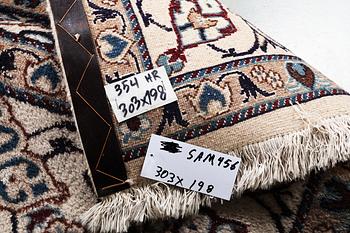 A carpet, Nain, part silk, 9 laa, ca. 303 x 198 cm.