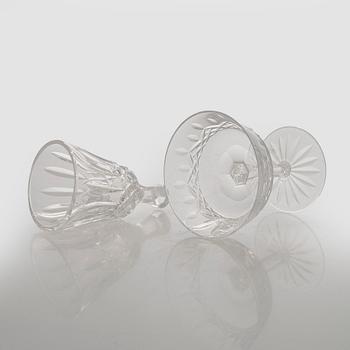 A set of 13 dessert bowls / champagne glasses, Waterford. and a table clock.