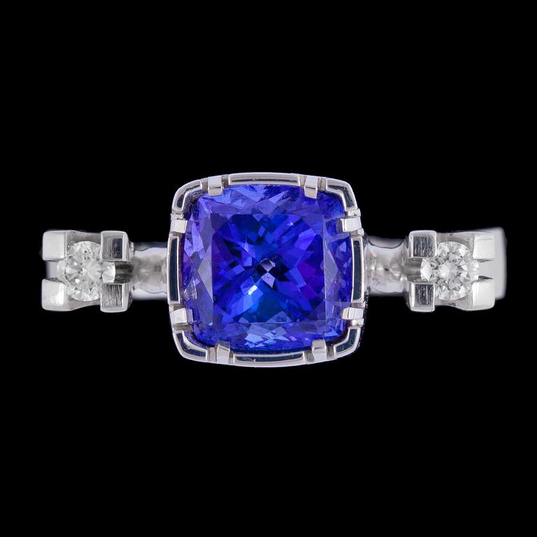 A tanzanite and brilliant cut diamond ring, tot. app. 0.12 cts.