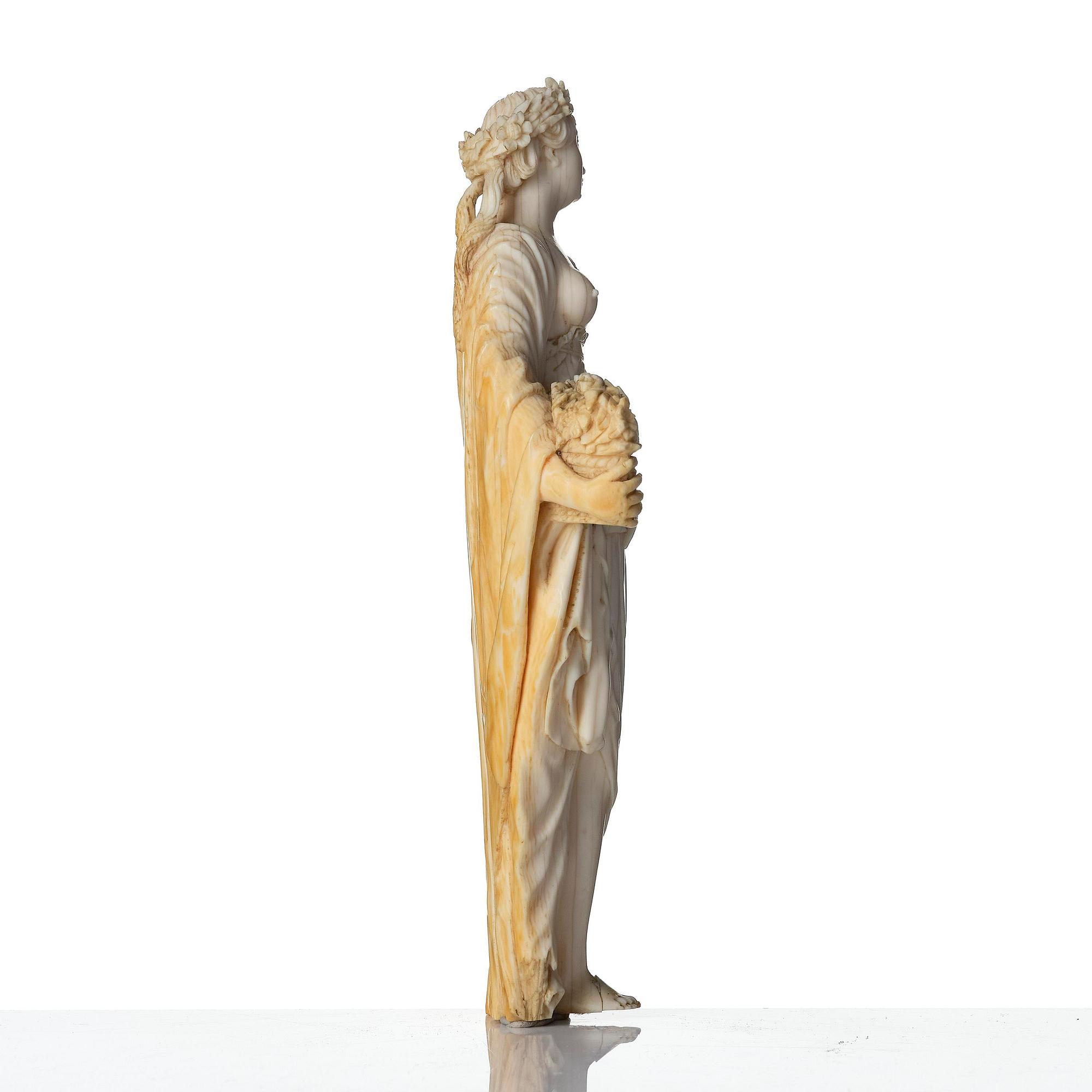 An ivory sculpture of Flora, circle of Frans van Bossuit, late 17th century.