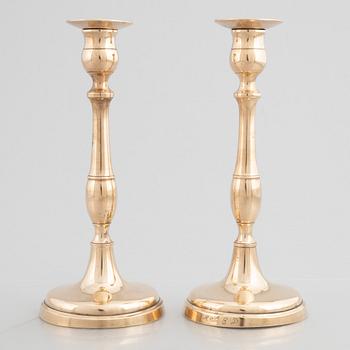 Skultuna Messinsbruk, two pairs of brass candlesticks, 19th century.