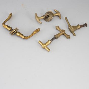 Seven bronze door handles, 19th/20th century.