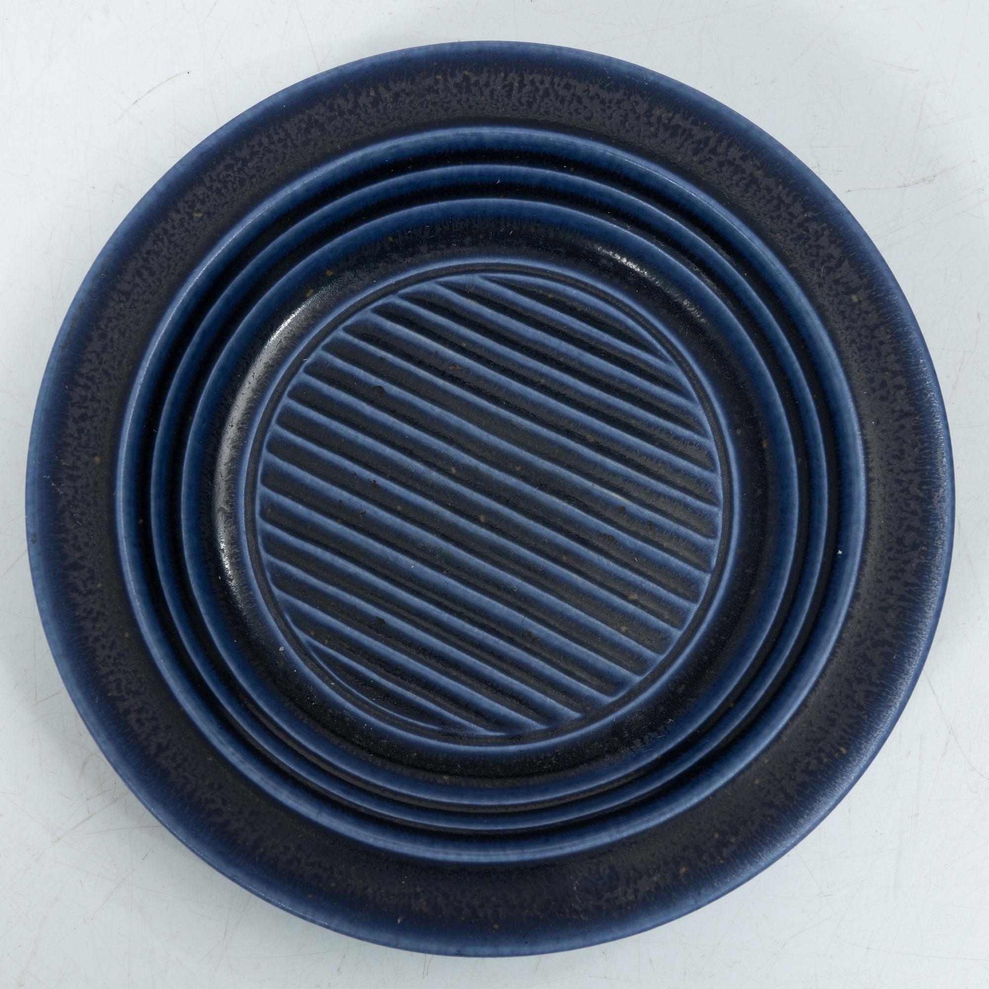 Kåge Verkstad, a set of three ceramic bowls and a small dish, Gustavsberg, Sweden, 1957-61.